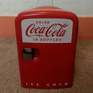 Coca-Cola warming and cooling mini fridge